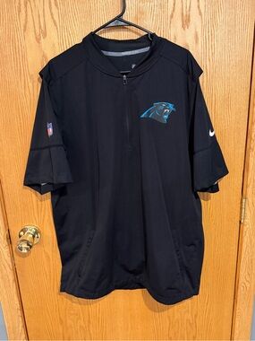 NFL Carolina Panthers Black Short-Sleeve Quarter-Zip on field jacket